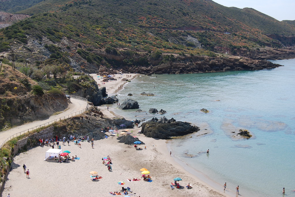 The tranquil sheltered cove of Porto Cauli with turquoise waters